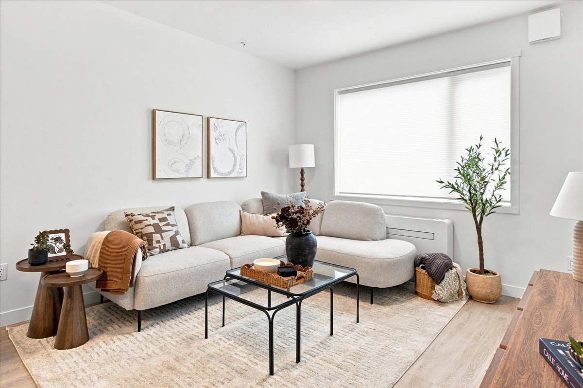 Edgeview living room Edgeview living room with large window and light wood floors